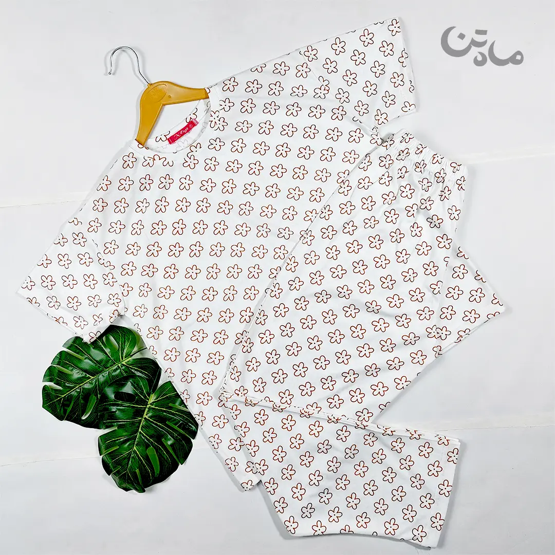 ست تیشرت وشلوار نخ پنبه طرح گل بابونه